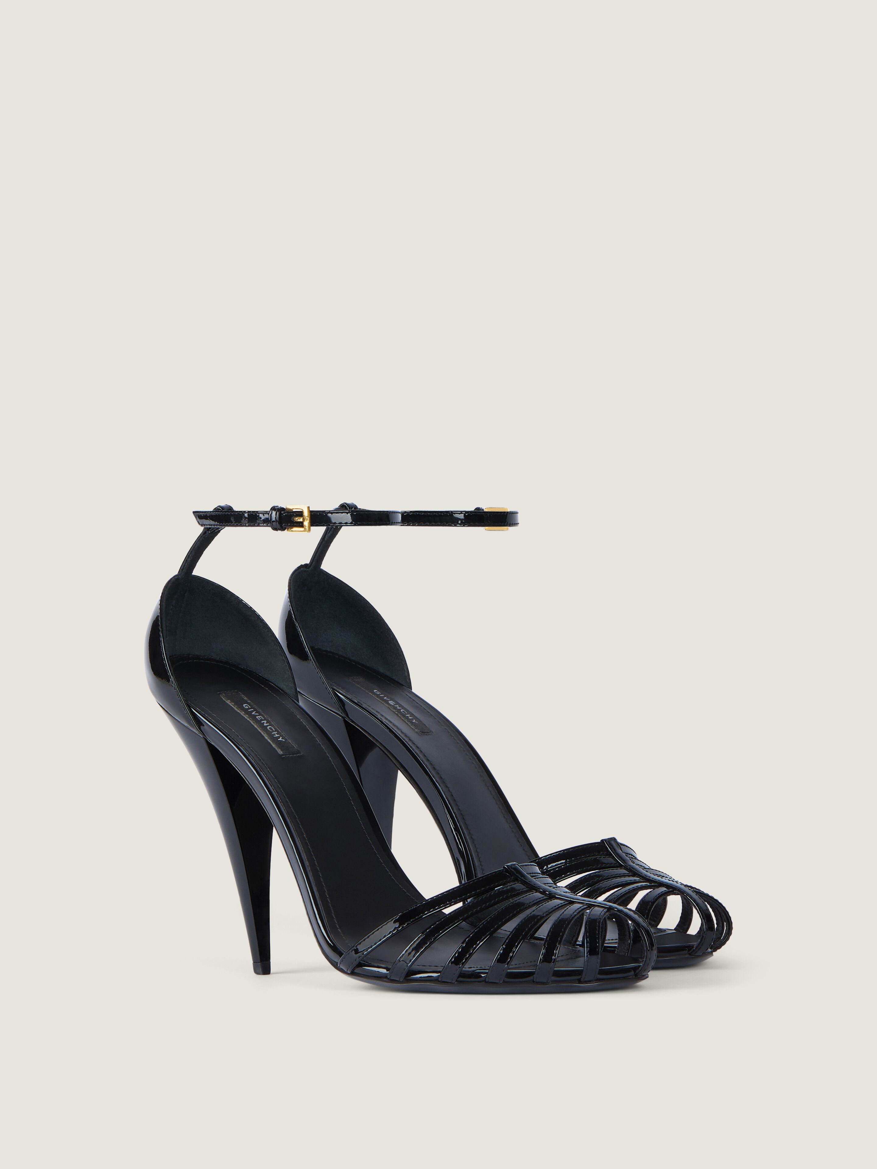 Cage heeled sandals in patent leather